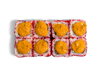 Uramaki roll isolated on white background. Japanese sushi roll with red caviar, black sesame and sauce