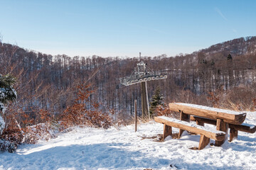 Winter landscape, cable car column and first snow on famous Sljeme mountain above Zagreb city