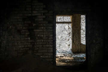 Fototapeta premium Old and abandoned, forsaken Brestovac hospital, deep in the snow covered forest of Medvednica mountain above Zagreb city, Croatia