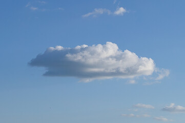 Clouds illuminated by the sun in the sky as background