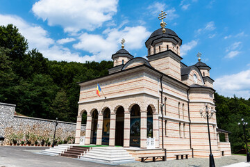 Fototapeta na wymiar Izbuc monastery. The new wall monastery from Izbuc. Bihor, Romania.