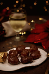 Glazed chestnuts,  traditional french sweets for winter holidays celebration. Cristmas dessert, festive dinner concept