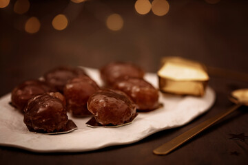 Glazed chestnuts,  traditional french sweets for winter holidays celebration. Cristmas dessert, festive dinner concept