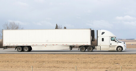 Heavy Cargo on the Road. A truck hauling freight along a highway