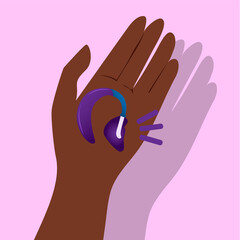 Obraz premium hand holding hearing aid