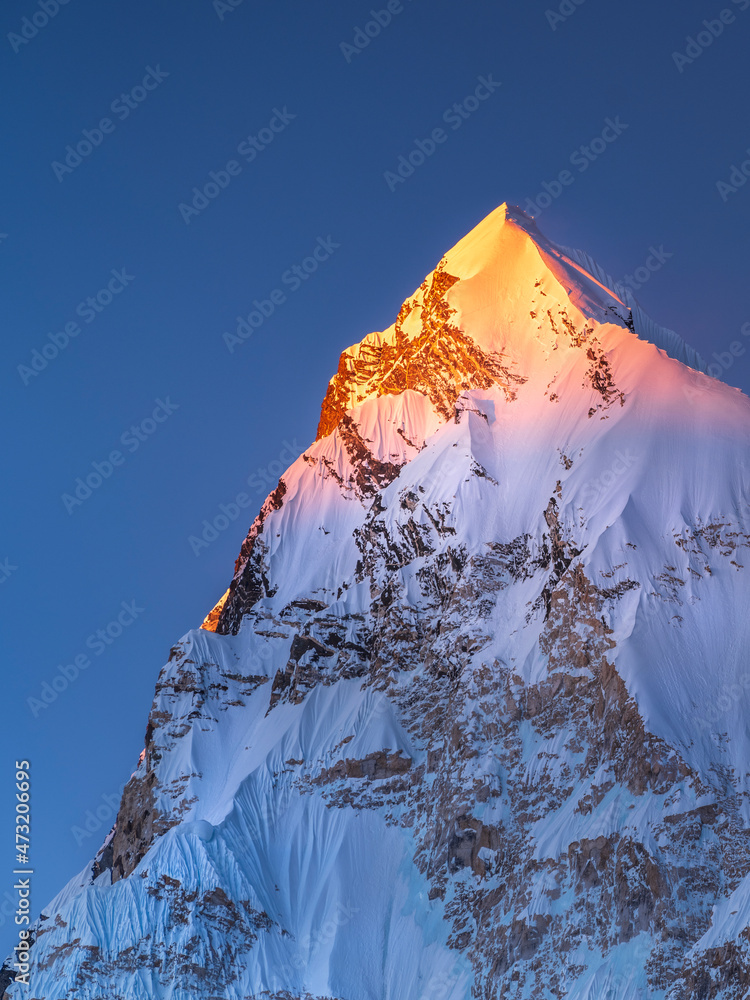 Wall mural last golden light on the snow peak in Himalaya in Nepal