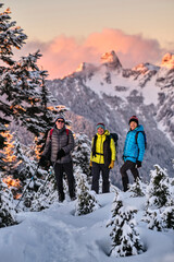 Group of people snowshoeing in mountains. Cypress Mountain ski resort. North Vancouver. British Columbia. Canada