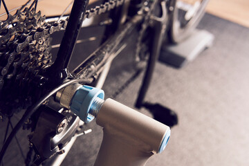 Smart trainer, Stay fit and active while at home. Indoor cycling in winter. close up.