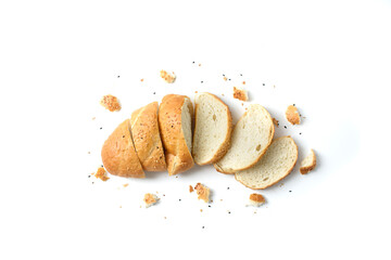 sliced sesame bread and bread crumbs on a white background