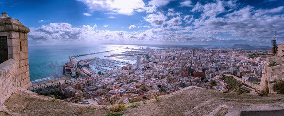 Scenic Alicante panoramic view from Santa Barbara Castle at marine, sea port and yachts in the seaside city of Alicante, Spain - obrazy, fototapety, plakaty
