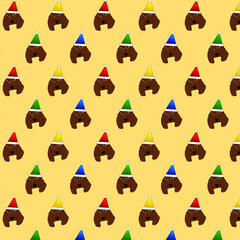 A seamless pattern with spaniel dogs in Christmas hats