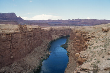 The Colorado River looks dark blue seen from the Navajo Bridge east of the Grand Canyon
