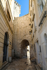 Fototapeta na wymiar Ancient stone archway in Old Town Split Croatia