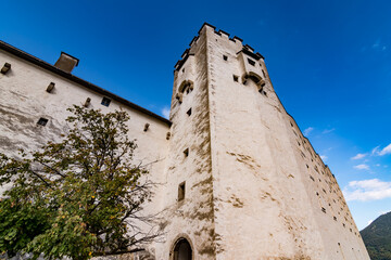 Classic close-up view of famous Hohensalzburg Fortress in the historic city of Salzburg and one of its towers