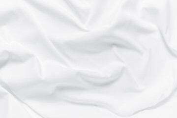 Obraz premium Abstract white fabric texture background. Cloth soft wave. Creases of satin, silk, and cotton.