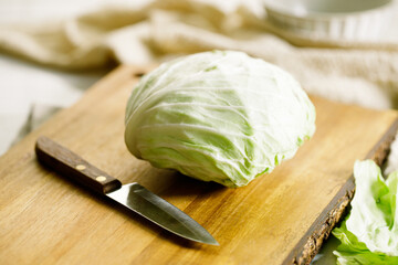Closeup of sliced cabbage, healthy meal cooking.