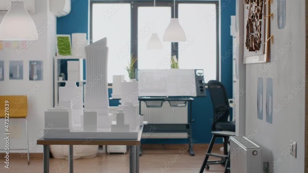 Poster empty space with maquette on table to design urban property plan and building model layout. nobody i