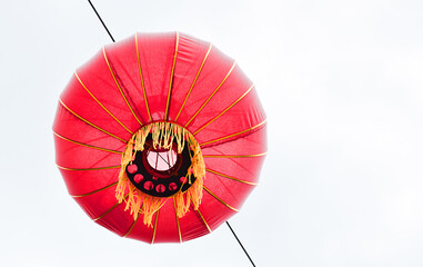 Red chinese lantern on white background © Julia