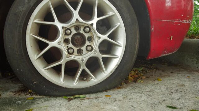 Flat tire at the car, close-up