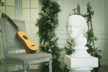 Musical still life in the Renaissance style with renaissance guitar