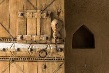 View of a door displayed in The Masmak Fort (1867), a clay and mudbrick fort in Riyadh, Saudi...