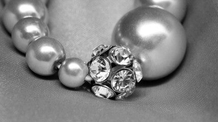 The diamond bracelet is very close, black and white color