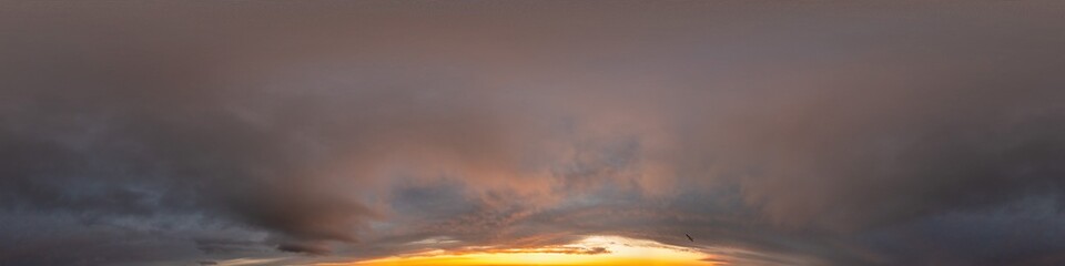 Obraz premium Red burning sunset sky panorama with Cumulus clouds. Seamless hdr 360 pano in spherical equirectangular format. Complete zenith for 3D visualization, game, sky replacement for aerial drone panoramas