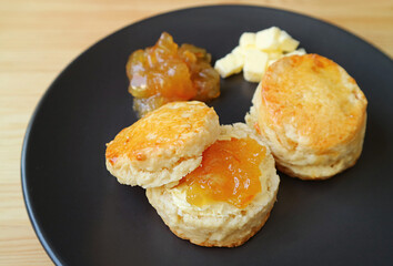 Mouthwatering Candied Orange Peel Scones with Butter and Orange Marmalade