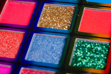 Flat lay of Broken bright multicolor eyeshadow as samples and swatches of cosmetic beauty product isolated on white background.