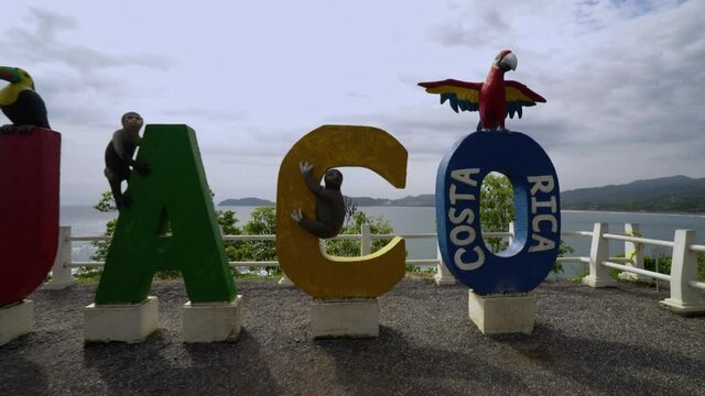 Colorful entry sign for the city of Jaco in Costa Rica