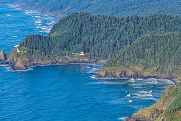 Fototapeta premium Aerial view of the Heceta Head Lighthouse and Cape Cove on the Oregon coast, USA