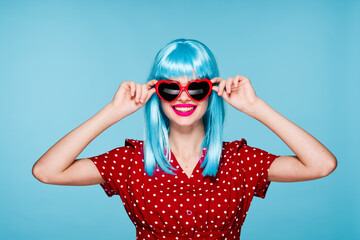 emotional woman blue wig sunglasses posing fashion