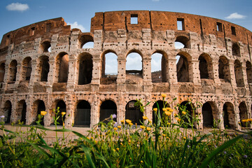 Obraz premium Colosseum in Rome. travel directions and rest in Italy. Europe sightseeing landmarks and tourism
