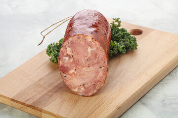 Pork ham sausage over board