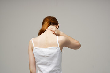 disgruntled woman pain in the neck arthritis chronic disease studio treatment