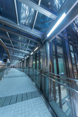 Modern pedestrian walkway and downtown district in Hong Kong city