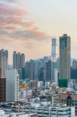 Naklejka premium Skyline of downtown district of Hong Kong city at dusk