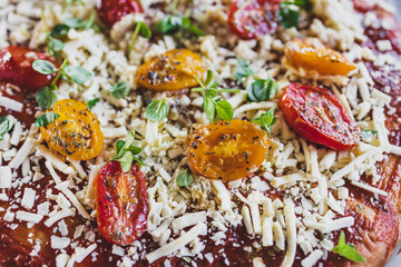 vegan margerita pizza with roasted cherry toatoes and dairy-free cheese, healthy plant-based food