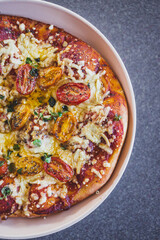 vegan margerita pizza with roasted cherry toatoes and dairy-free cheese, healthy plant-based food
