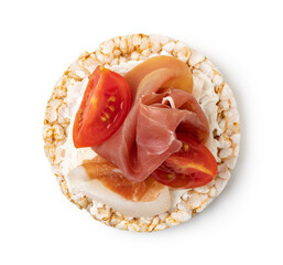 Rice cakes with cream cheese, prosciutto and tomato