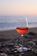glass of wine on the beach