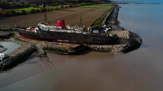 Aerial View of TSS Duke of Lancaster currently beached near Mostyn Docks, North Wales - drone shot