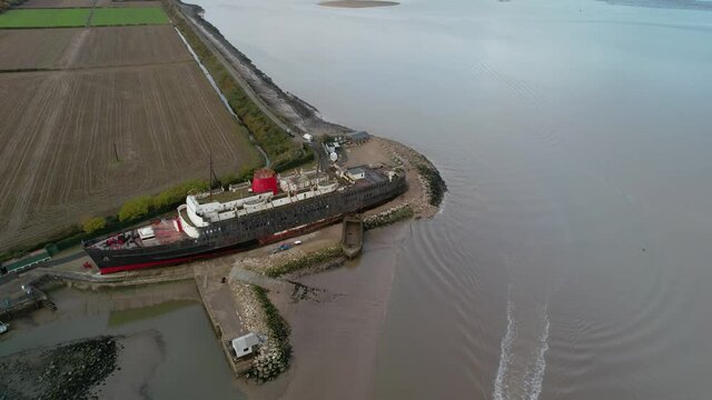 TSS Duke Of Lancaster Abandoned Railway Steamer Passenger Ship Docked In Mostyn Docks, UK. aerial orbit