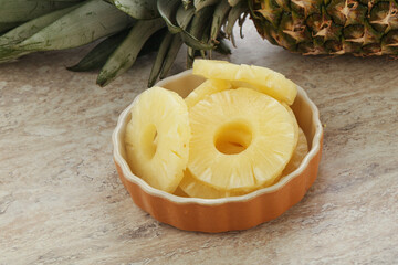 Marinated pineapple rings in the bowl