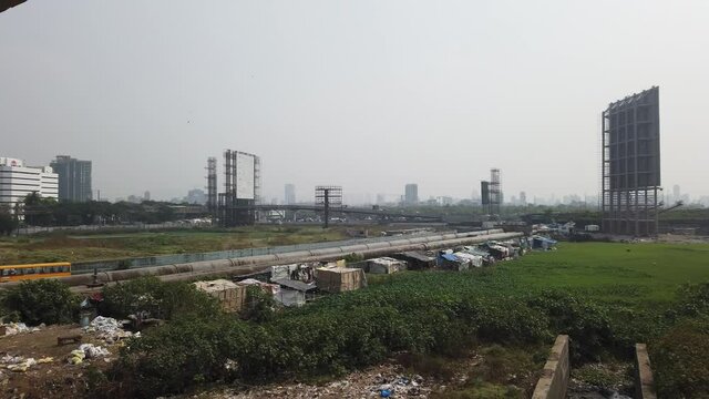Bandra - Mahim linking rail bridge water pipeline mumbai India slum