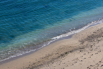a small wave on the sand
