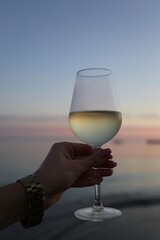 glass of wine in the beach