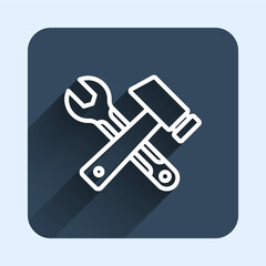 White line Crossed hammer and wrench spanner icon isolated with long shadow background. Hardware tools. Blue square button. Vector