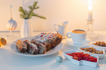 christmas baked goods with cup of coffee on white table