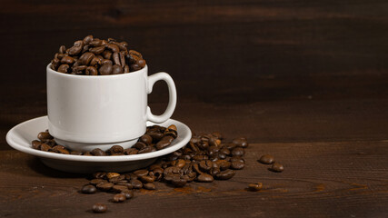 Cup of coffee on brown background